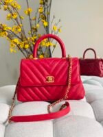 Chanel Flap Bags with Top handle chevron patterened with gold tone CC turn-lock closures - Image 2