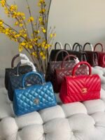 Chanel Flap Bags with Top handle chevron patterened with gold tone CC turn-lock closures - Image 7