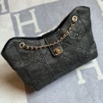 Chanel Braided Raffia Shopping Bag with iconic CC turn-lock closure