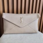 Saint Laurant Cassandre envelope clutch in iconic gold-tone YSL monogram - Image 2