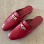 Hermès Oz Mules in goatskin with the iconic palladium-plated kelly buckle
