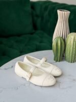 Chanel Quilted Leather Mary Jane flats with signature interlocking CC logo - Image 7
