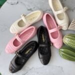 Chanel Quilted Leather Mary Jane flats with signature interlocking CC logo