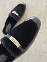 Hermès Oz Mules in Black, Crafted in tan leather with plush ecru shearling lining & a silver tone kelly buckle - Image 3